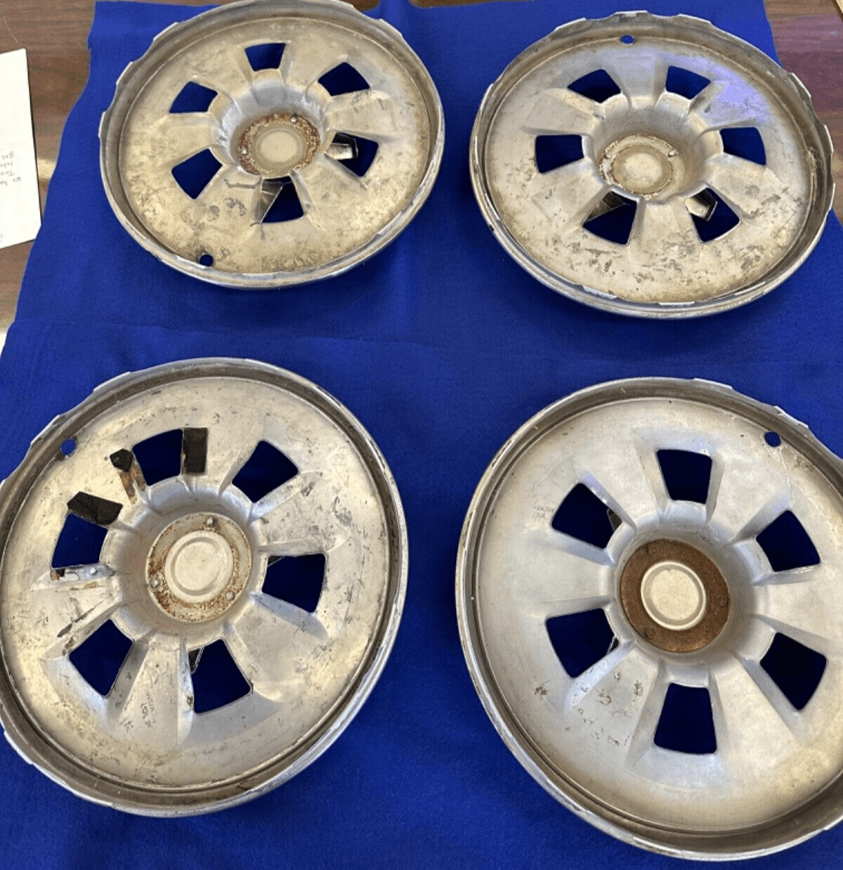 OEM 1965 Corvette Hub Caps & Spinners — Complete Set